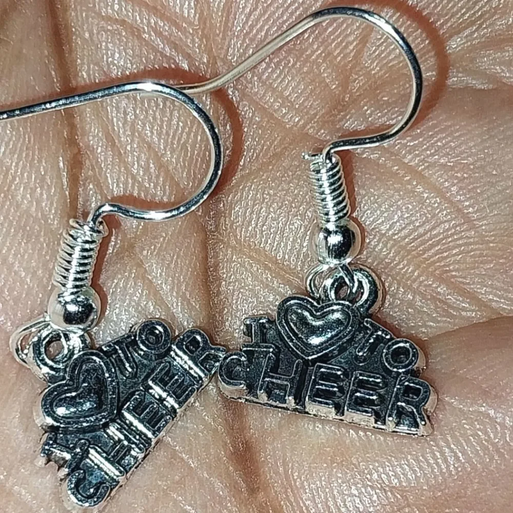 Hand crafted antique cheerleader earrings